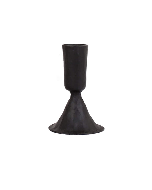 A black forged iron candle holder. 