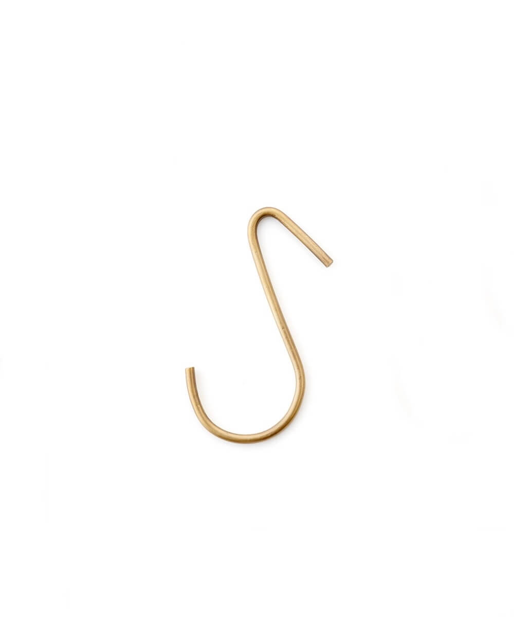 A brass 'S' shaped metal hook.