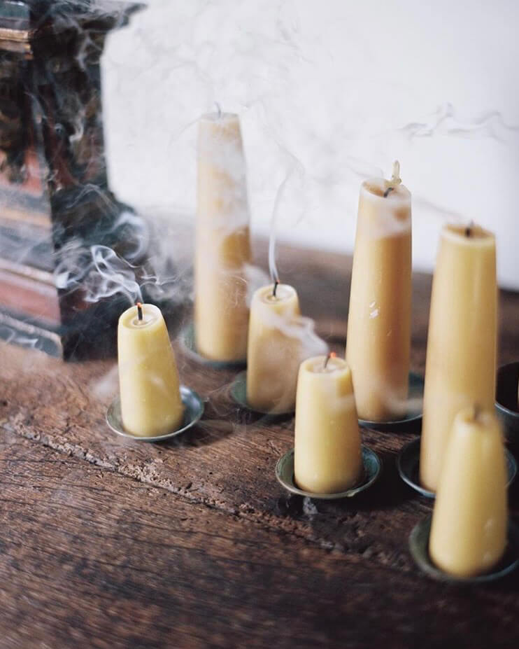 Collection of stubby and large stubby pure beeswax candles.