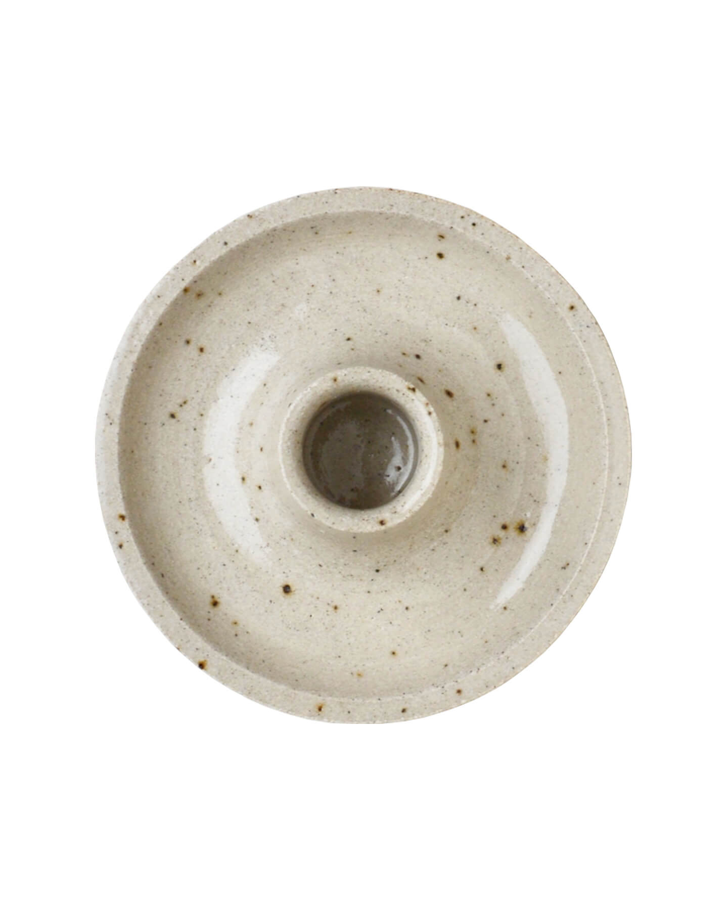 An oatmeal coloured ceramic dinner candle holder, on a white background.