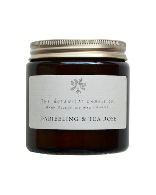 Darjeeling and Tea Rose scented soy candle by The Botanical Candle Co, on a white background.