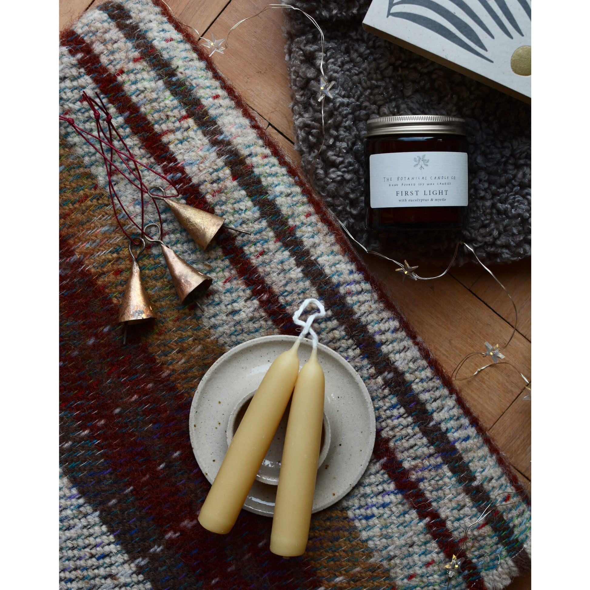 First Light Winter Candle with recycled wool blanket and beeswax candles.