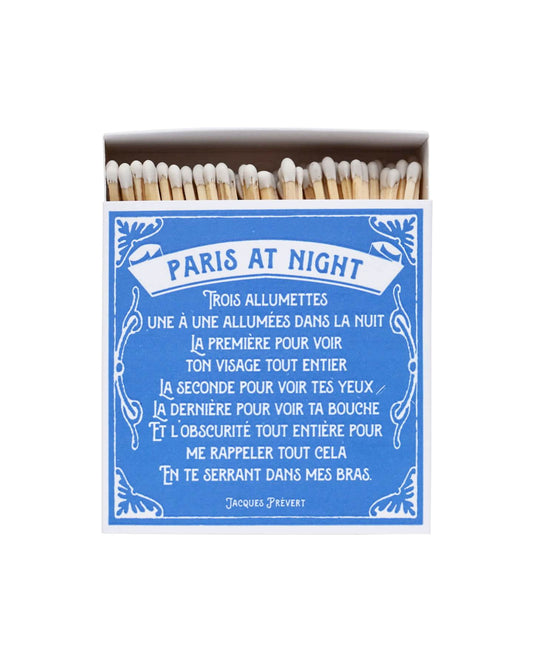 Blue and white matchbox, with a poem entitled 'Paris at Night'.