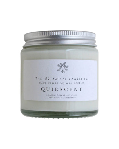 Quiescent scented candle by The Botanical Candle Co, on a white background.