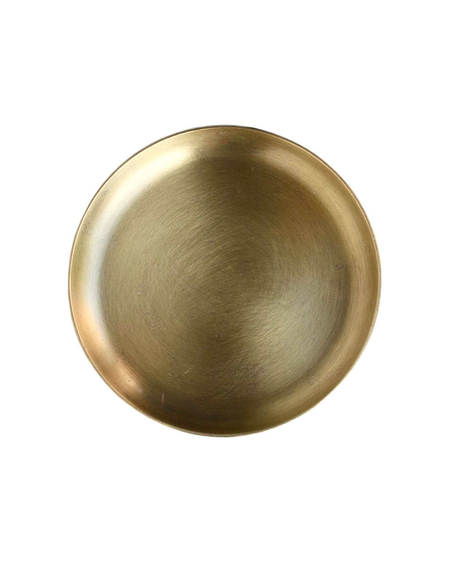 A solid brass circular candle dish, on a white background.