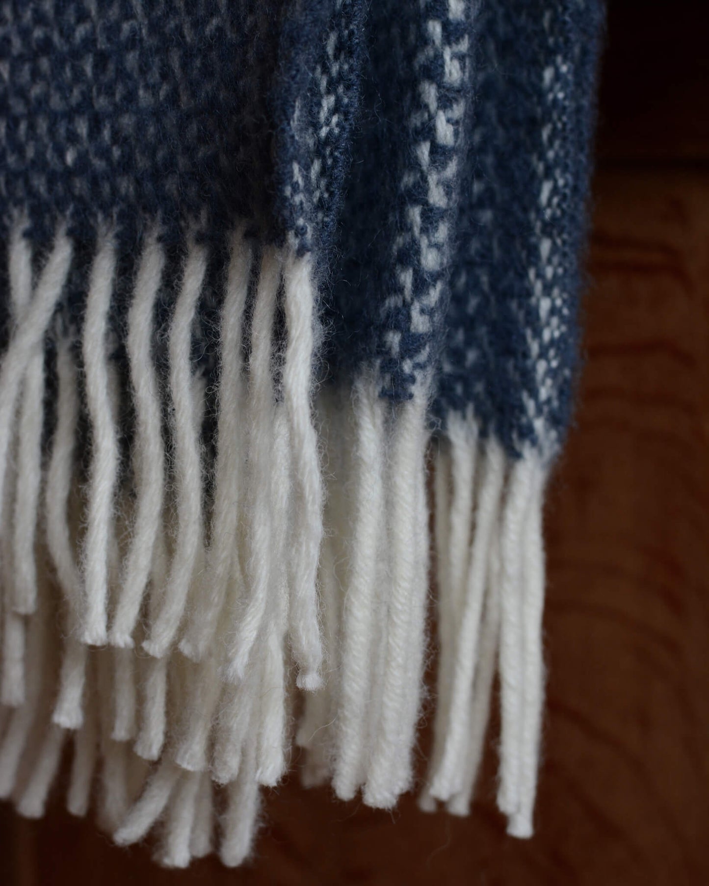 Detail of a blue woollen blanket.